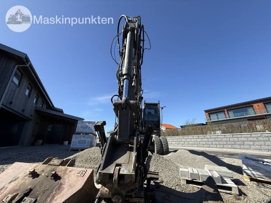 2012 Atlas 160W wheel excavator, front view of boom and attachment