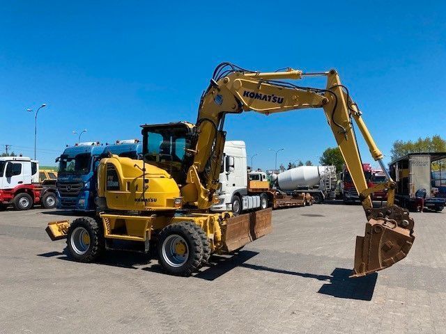 2011 Komatsu PW118 MR-8 wheel excavator, side profile view