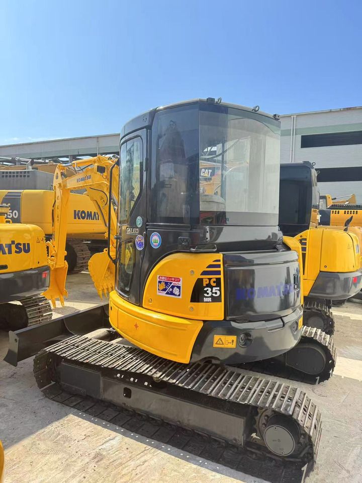 2020 Komatsu PC35MR mini excavator, rear three-quarter view 2020 Komatsu PC35MR mini excavator, rear three-quarter view