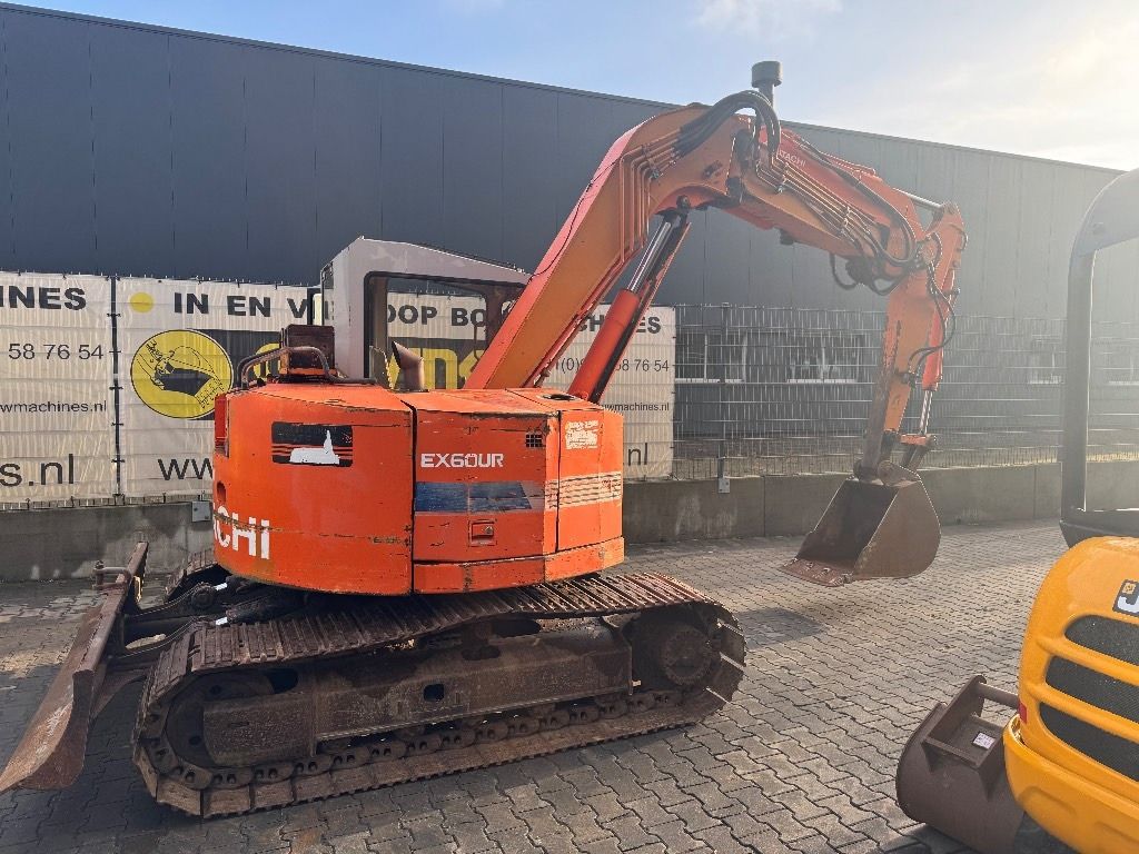 Hitachi EX60UR mini excavator, rear three-quarter view