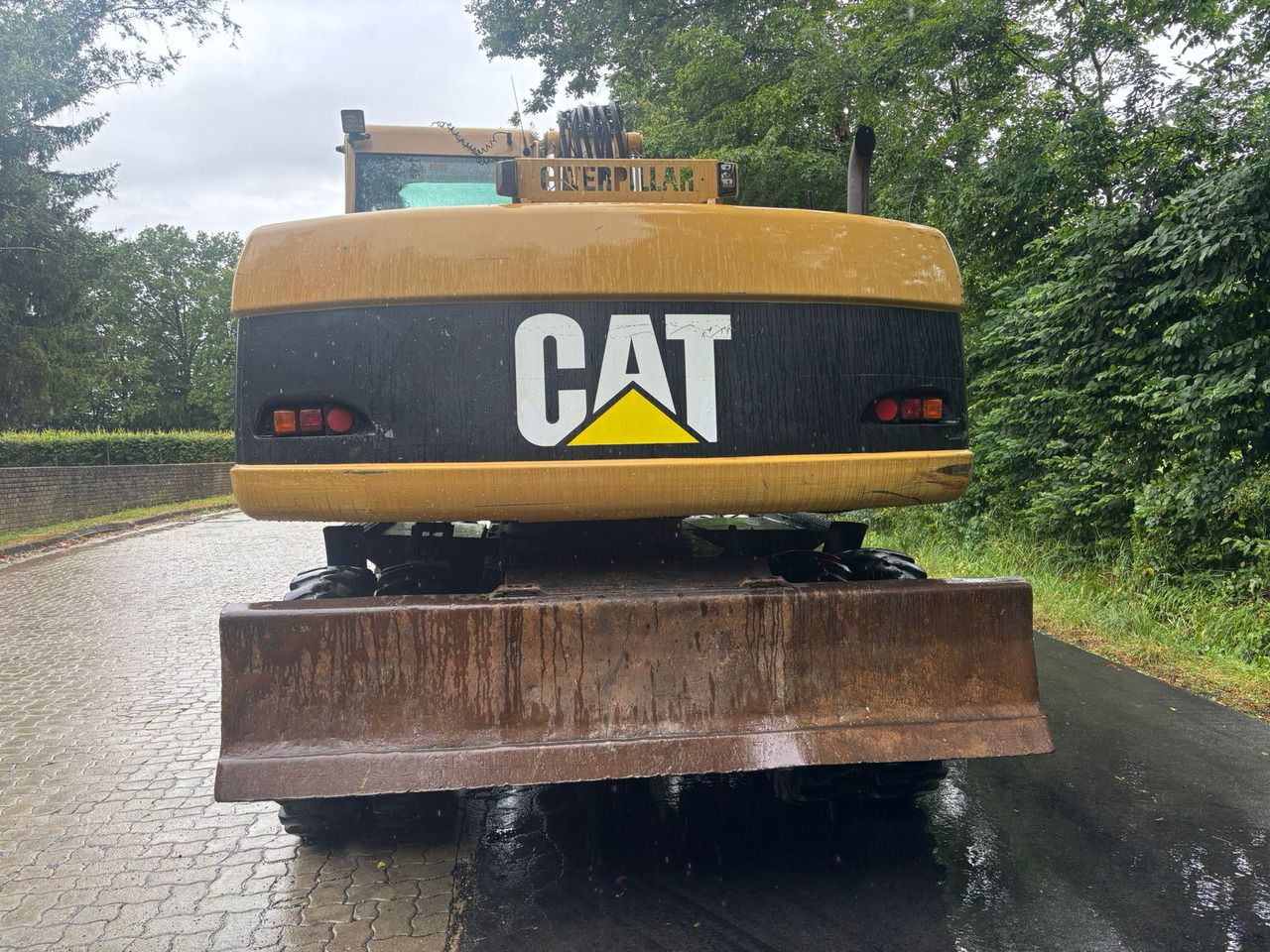 2005 Caterpillar M316C wheel excavator, rear view 2005 Caterpillar M316C wheel excavator, rear view