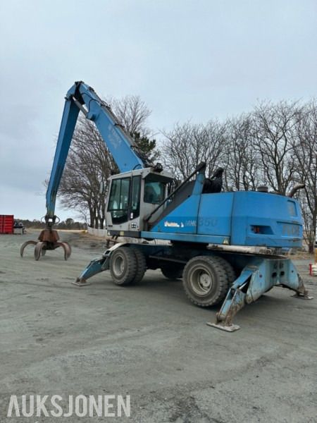 2006 Terex Fuchs MHL350 wheel excavator, side view