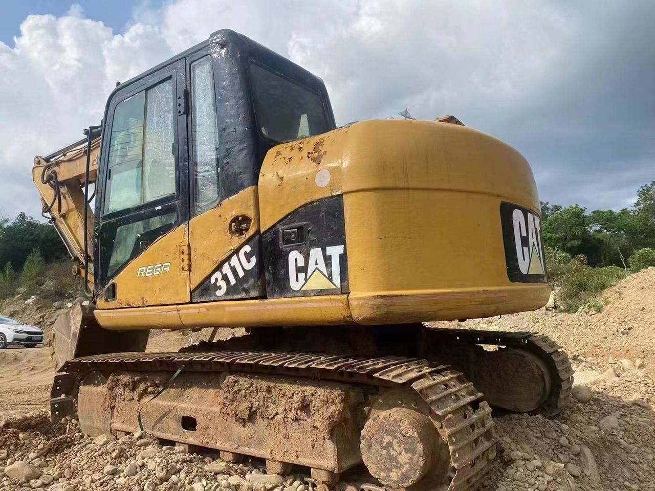 2022 Caterpillar 311C crawler excavator, rear three-quarter view
