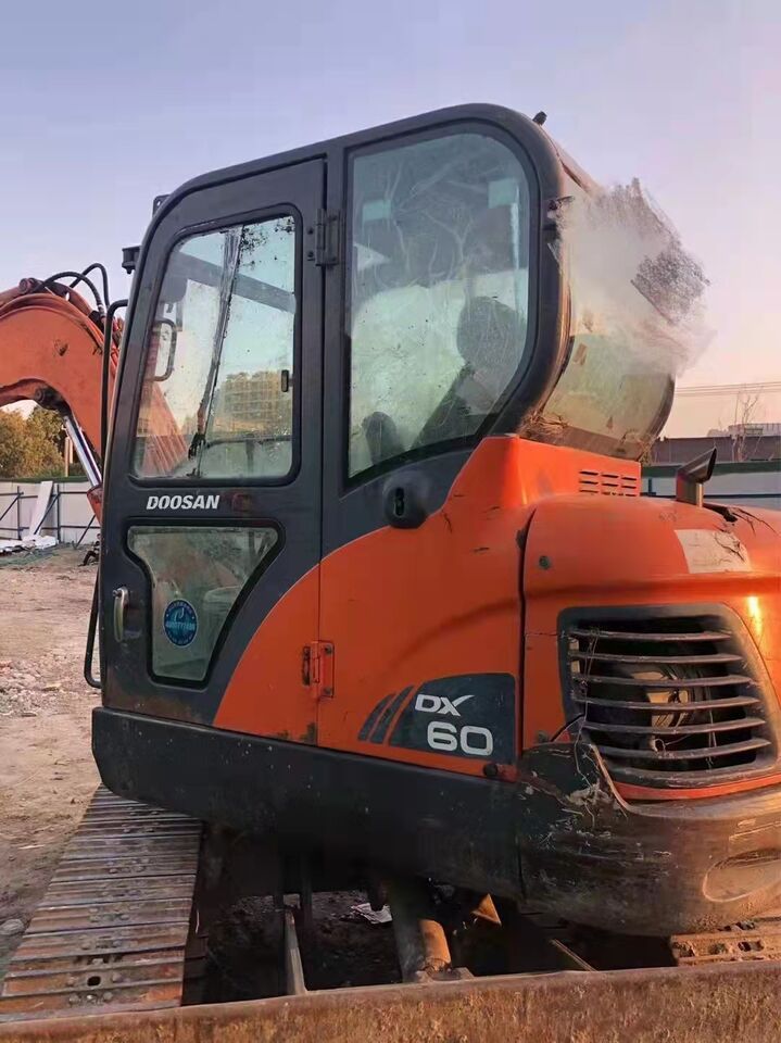 2024 Doosan DX60 mini excavator, side profile view 2024 Doosan DX60 mini excavator, side profile view