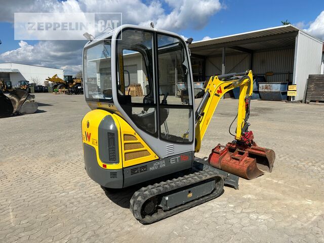 2022 Wacker Neuson ET16 mini excavator, rear three-quarter view 2022 Wacker Neuson ET16 mini excavator, rear three-quarter view