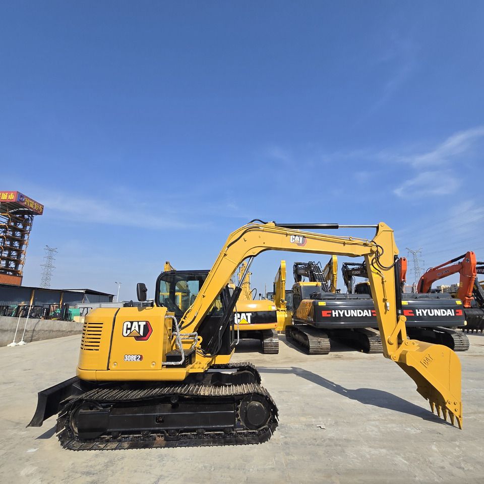 2023 Caterpillar 308E2 mini excavator, side profile view