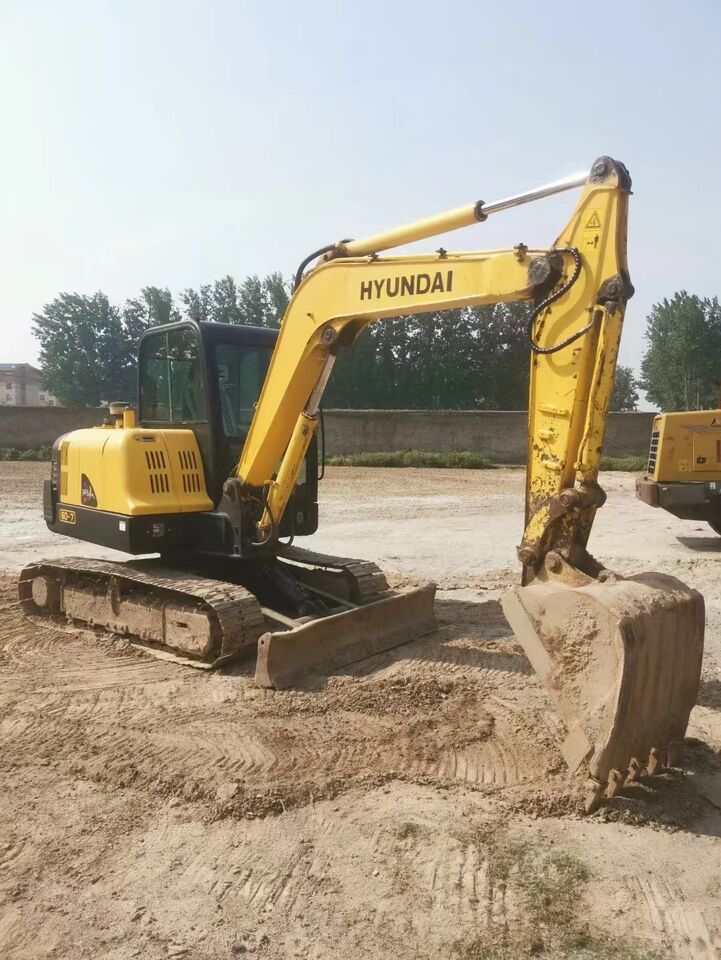 2023 Hyundai 60-7 mini excavator, side profile view