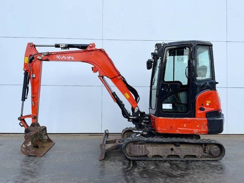 2020 Kubota KX037-4 mini excavator, side view 2020 Kubota KX037-4 mini excavator, side view