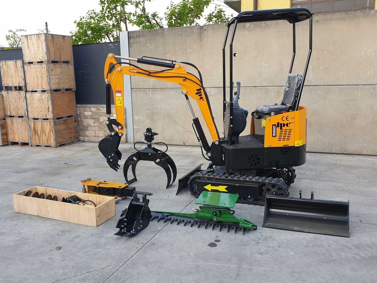 2026 JPC HT-12 mini excavator with attachments, side view 2026 JPC HT-12 mini excavator with attachments, side view
