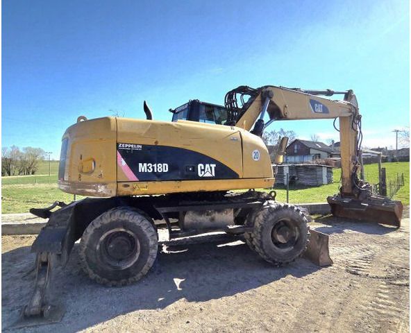2009 Caterpillar M318D wheel excavator, side profile view