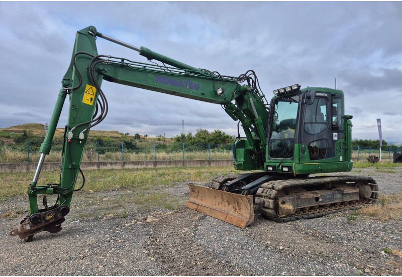2018 Komatsu PC138US-11 crawler excavator, side profile view