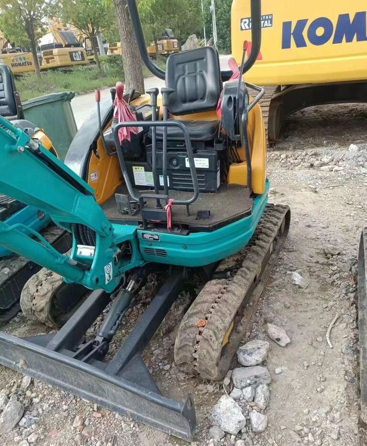 Kubota U-20 mini excavator, rear view of open operator station Kubota U-20 mini excavator, rear view of open operator station