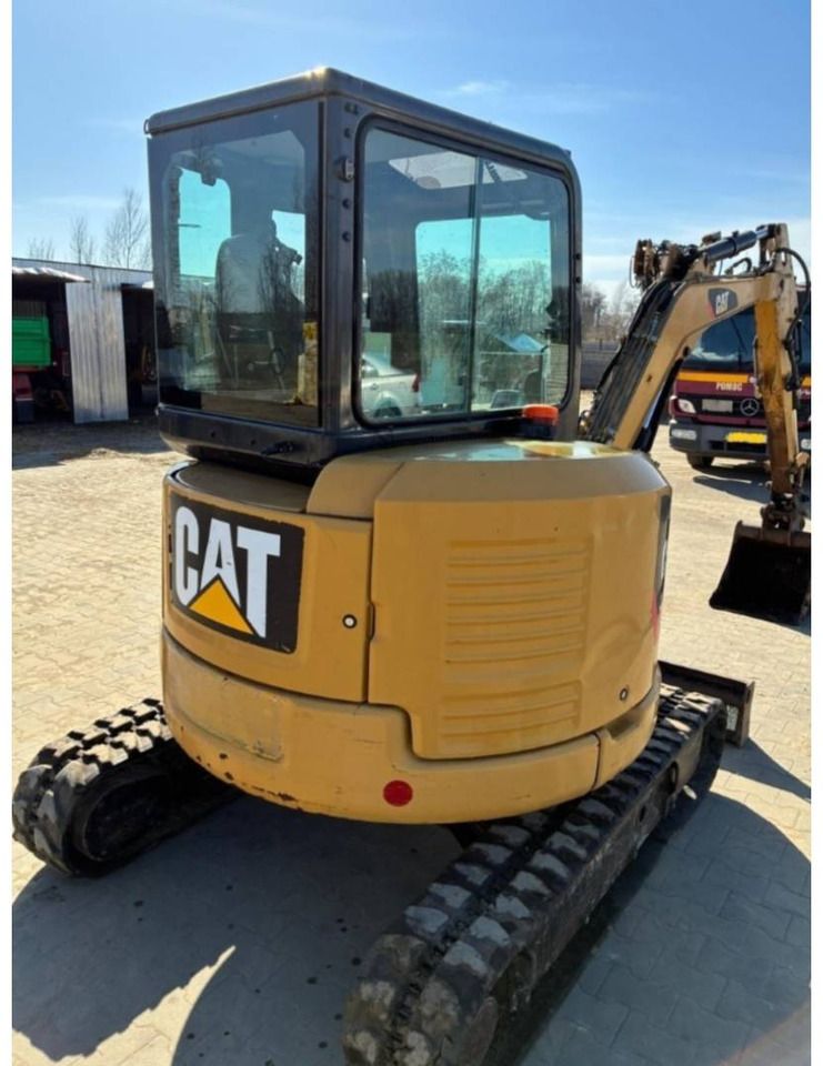 2015 Caterpillar 303.5ECR crawler excavator, rear three-quarter view 2015 Caterpillar 303.5ECR crawler excavator, rear three-quarter view