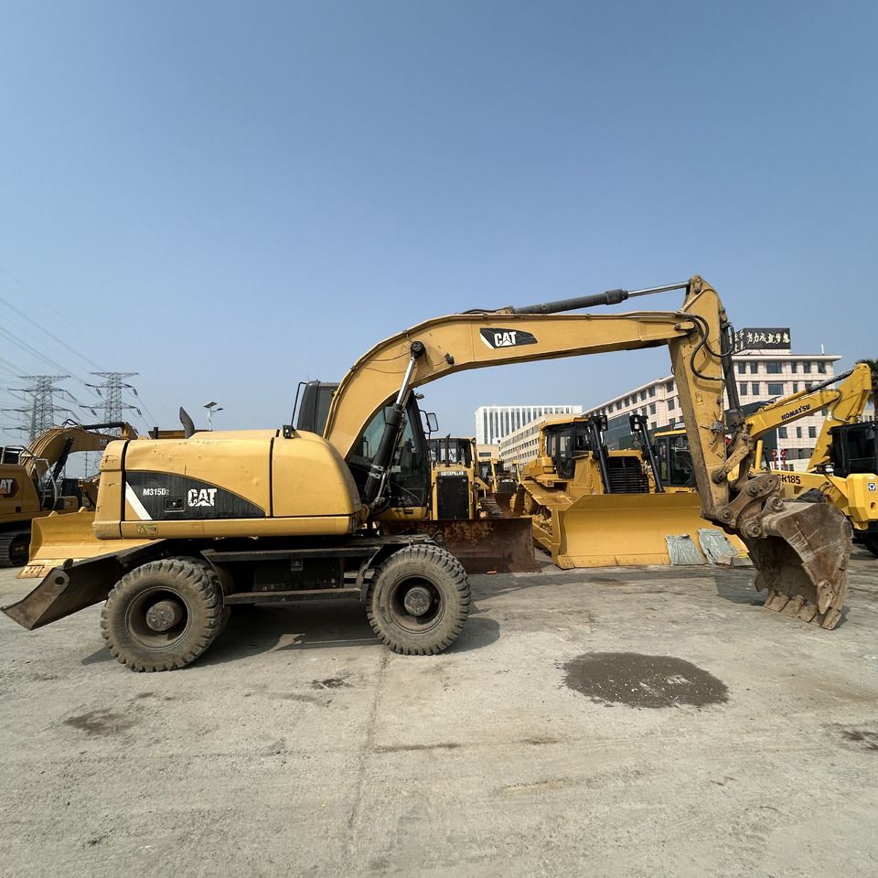 2018 Caterpillar M315D2 wheel excavator, side profile view 2018 Caterpillar M315D2 wheel excavator, side profile view