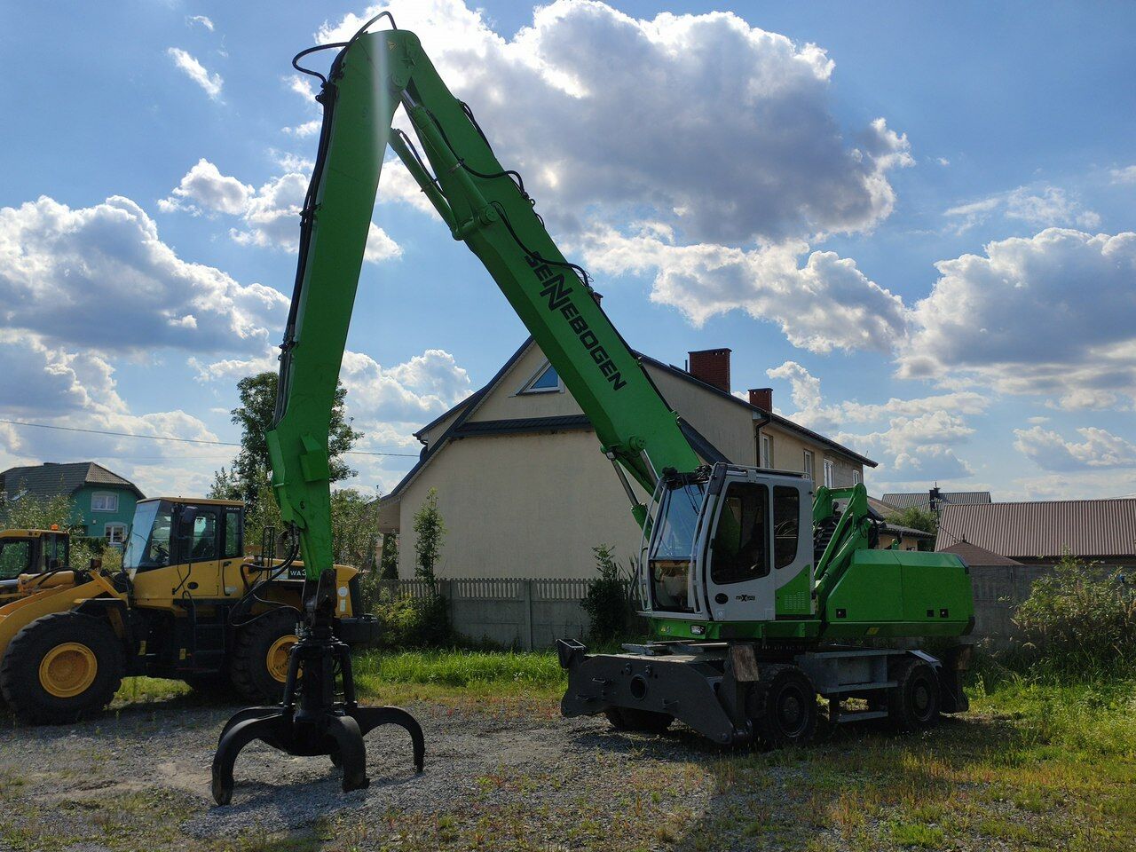 2012 Sennebogen 825 material handler, side profile view