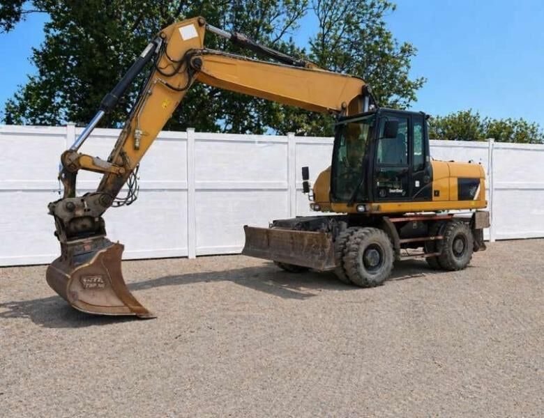 2014 Caterpillar M318D wheel excavator, side profile view 2014 Caterpillar M318D wheel excavator, side profile view