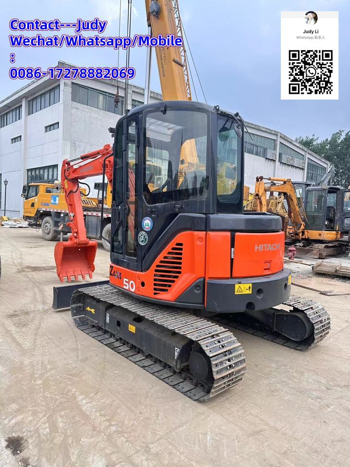 2023 Hitachi ZX50 mini excavator, rear three-quarter view 2023 Hitachi ZX50 mini excavator, rear three-quarter view