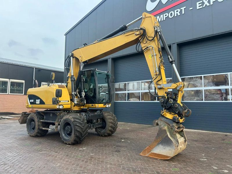 2014 Caterpillar M315D wheel excavator, side profile view