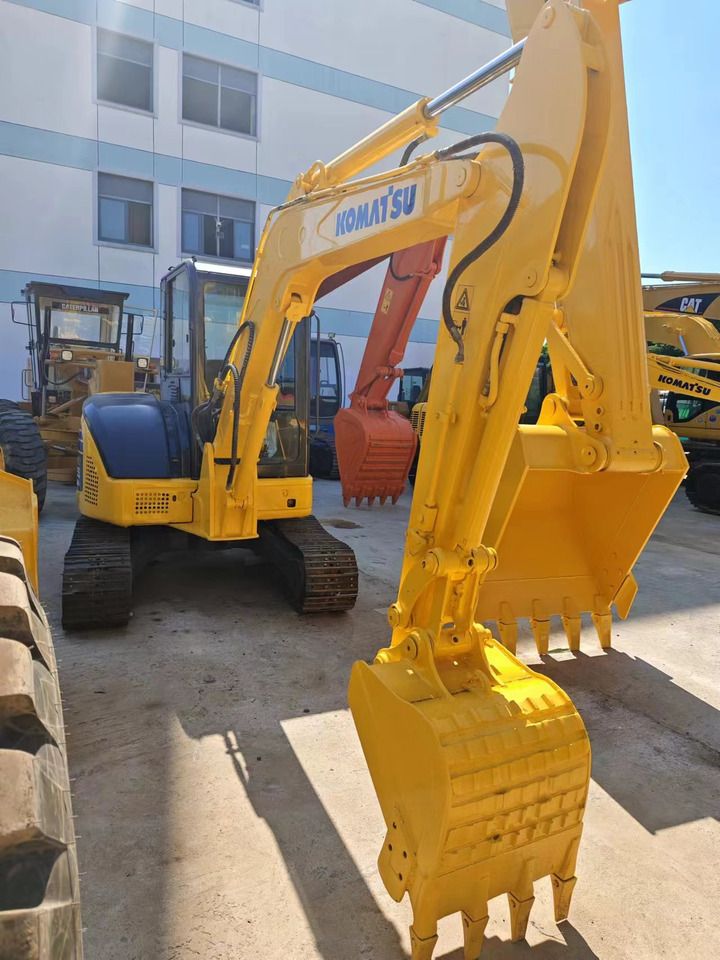 2018 Komatsu PC-55MR mini excavator, front three-quarter view