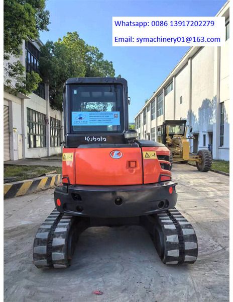2023 Kubota KX057-4 mini excavator rear view 2023 Kubota KX057-4 mini excavator rear view