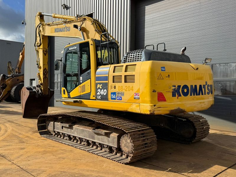2015 Komatsu PC240LC-10 crawler excavator, rear three-quarter view 2015 Komatsu PC240LC-10 crawler excavator, rear three-quarter view