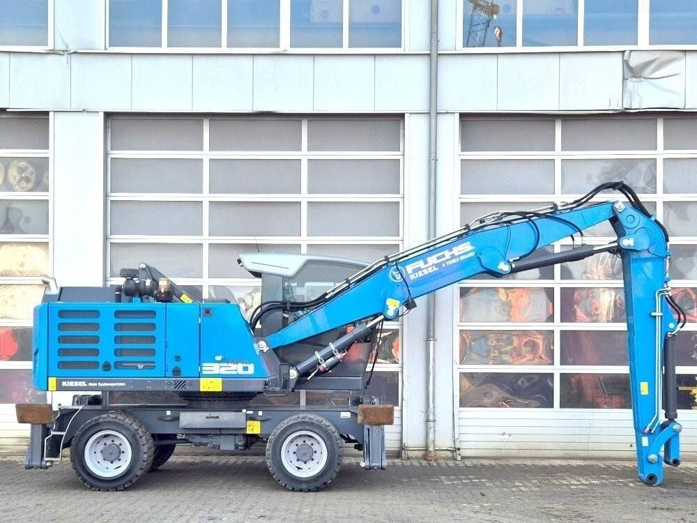 2023 Fuchs MHL320F material handler, side view