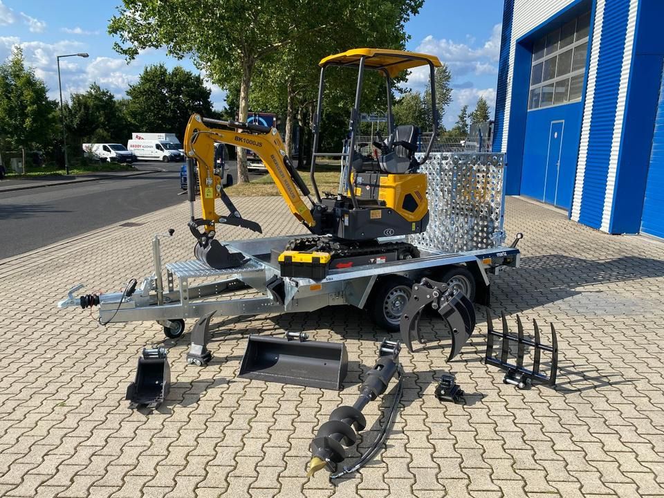 Berger Kraus BK1000JS mini excavator on trailer, side view Berger Kraus BK1000JS mini excavator on trailer, side view
