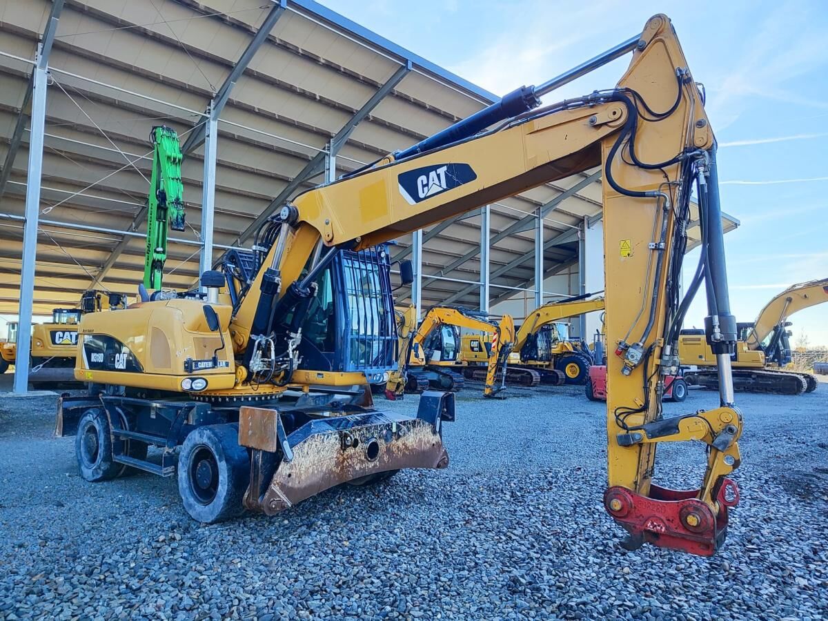 2014 Caterpillar M318D MH wheel excavator, side view