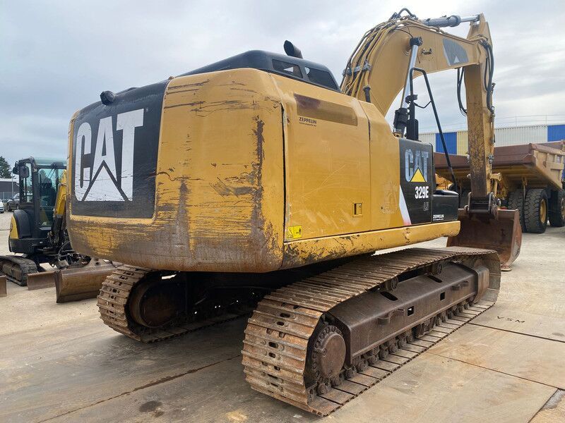 2012 Caterpillar 329E crawler excavator, rear three-quarter view