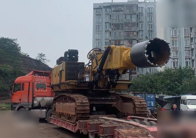2016 Caterpillar 6015FS crawler excavator with rock saw attachment, side view 2016 Caterpillar 6015FS crawler excavator with rock saw attachment, side view