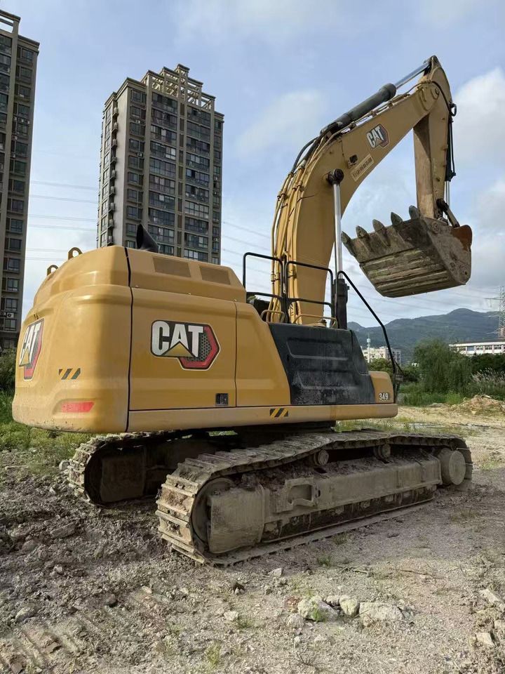 2021 Caterpillar 349 crawler excavator, rear three-quarter view 2021 Caterpillar 349 crawler excavator, rear three-quarter view