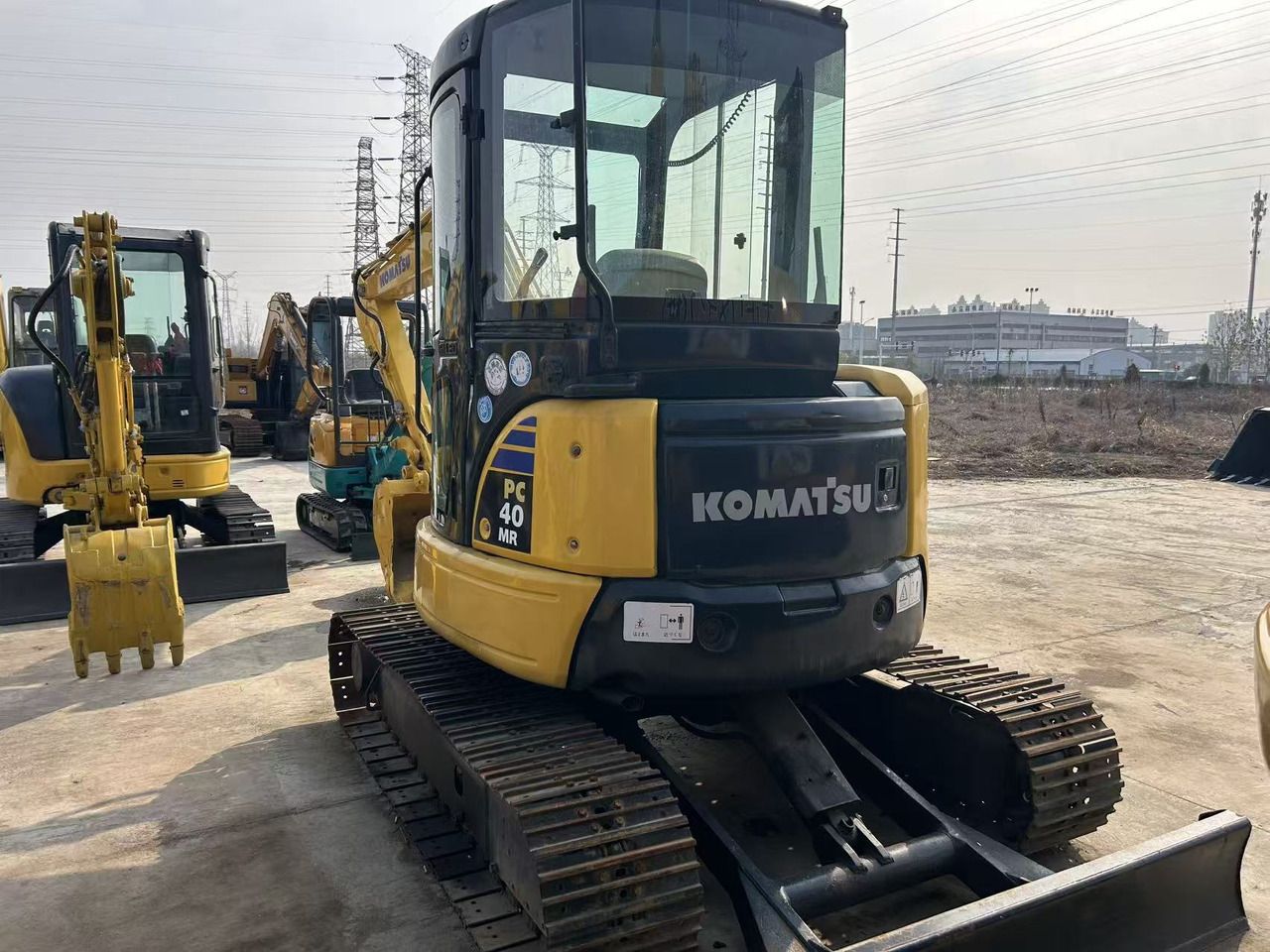 2024 Komatsu PC40 MR mini excavator, rear three-quarter view 2024 Komatsu PC40 MR mini excavator, rear three-quarter view