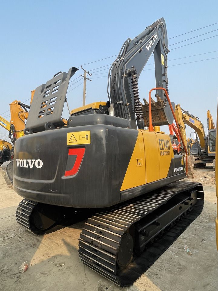 2023 Volvo EC140 crawler excavator, rear three-quarter view 2023 Volvo EC140 crawler excavator, rear three-quarter view