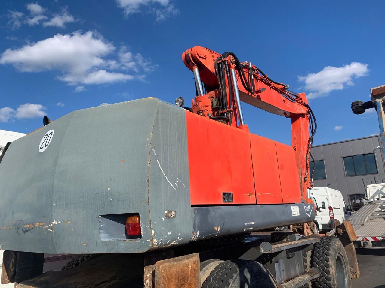 2001 O&K MH 5.5 wheel excavator, rear three-quarter view