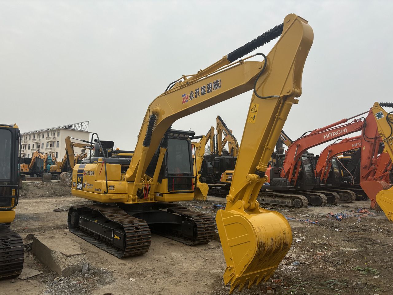 2022 Komatsu PC160 crawler excavator, rear three-quarter view 2022 Komatsu PC160 crawler excavator, rear three-quarter view