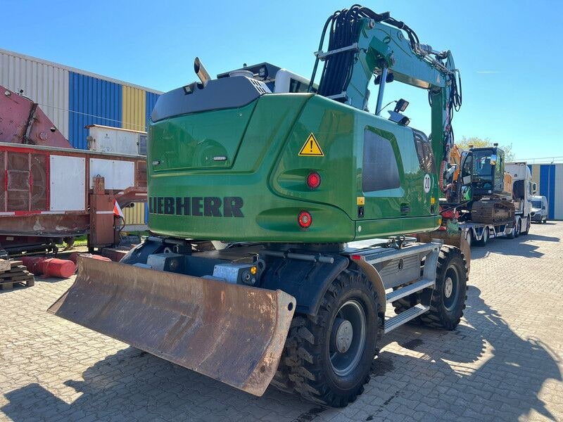 2017 Liebherr A914 Compact wheel excavator rear view 2017 Liebherr A914 Compact wheel excavator rear view