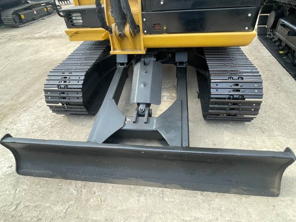 2024 Caterpillar 305.5E2 mini excavator front blade view 2024 Caterpillar 305.5E2 mini excavator front blade view