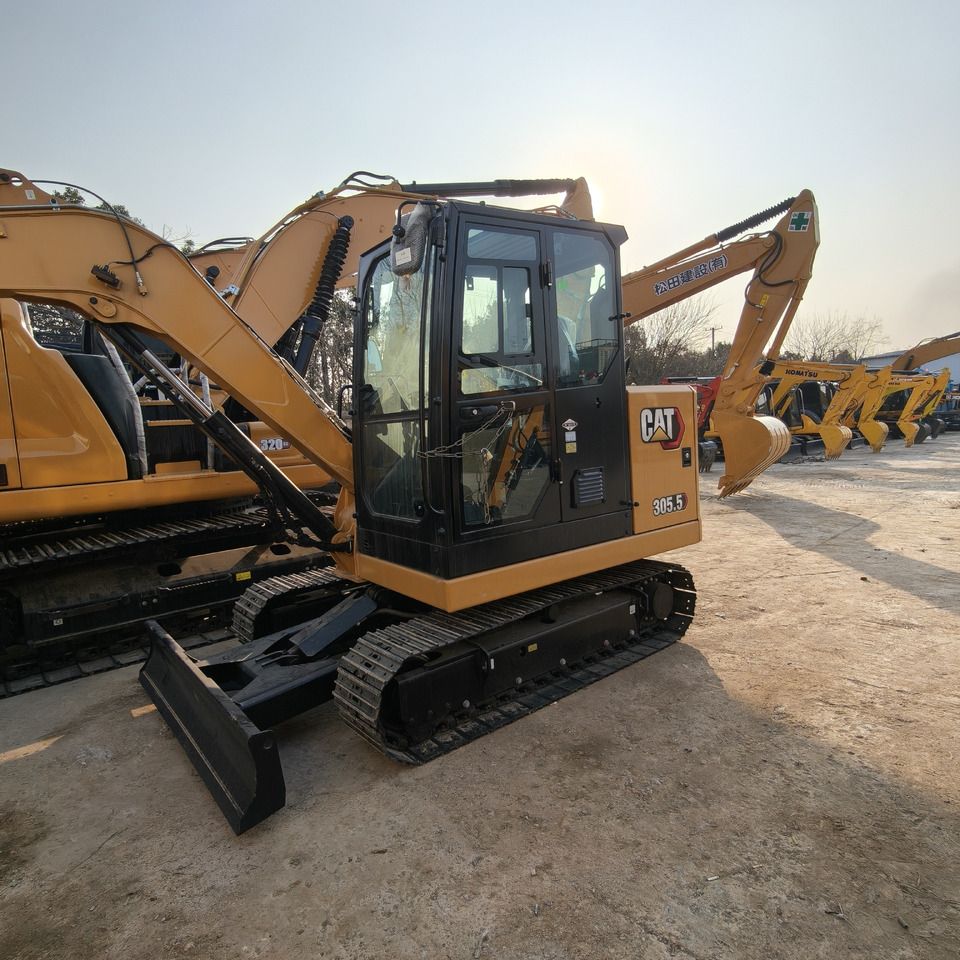 2026 Caterpillar 305.5E2 mini excavator, side view 2026 Caterpillar 305.5E2 mini excavator, side view