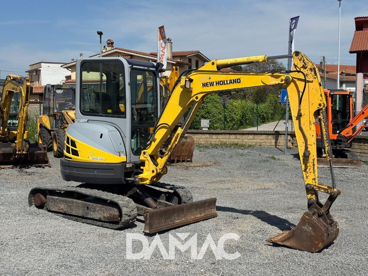 2006 New Holland E352SR mini excavator, side view 2006 New Holland E352SR mini excavator, side view