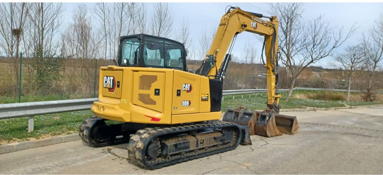 2023 Caterpillar 308 crawler excavator, rear three-quarter view 2023 Caterpillar 308 crawler excavator, rear three-quarter view
