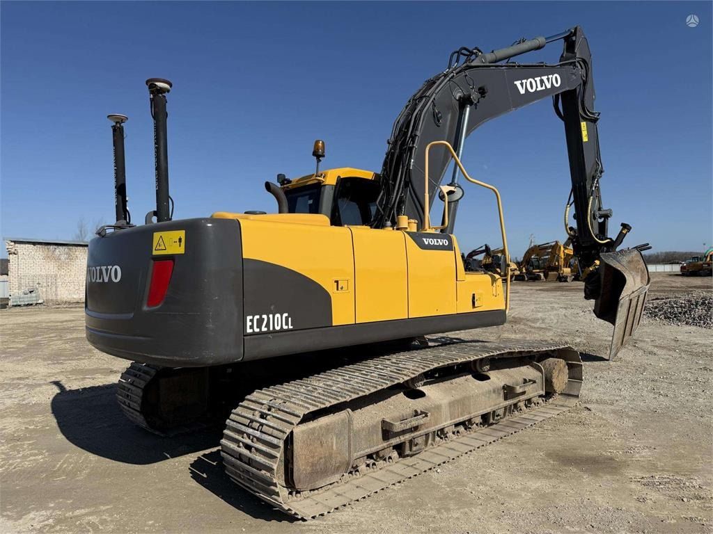 2011 Volvo EC210CL crawler excavator, rear three-quarter view 2011 Volvo EC210CL crawler excavator, rear three-quarter view
