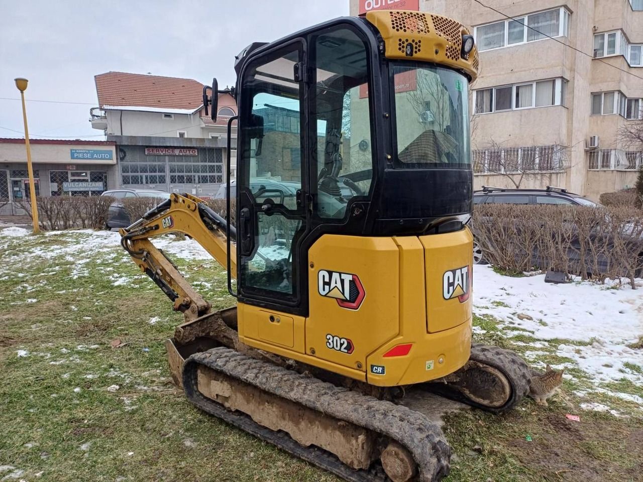 2021 Caterpillar 302 CR crawler excavator, rear three-quarter view 2021 Caterpillar 302 CR crawler excavator, rear three-quarter view