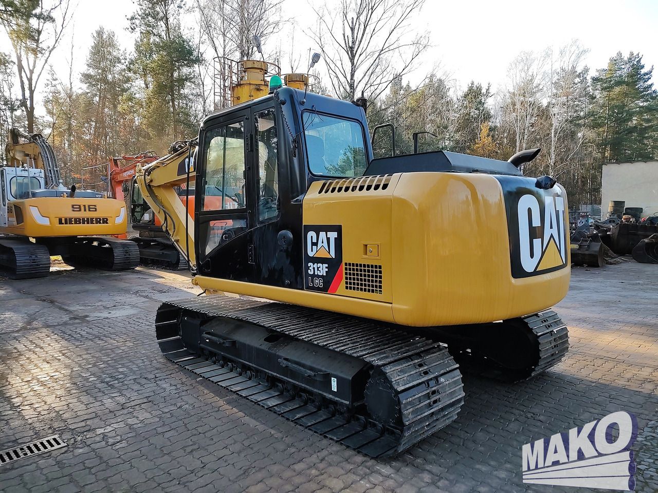 2015 Caterpillar 313FLGC crawler excavator, rear three-quarter view 2015 Caterpillar 313FLGC crawler excavator, rear three-quarter view