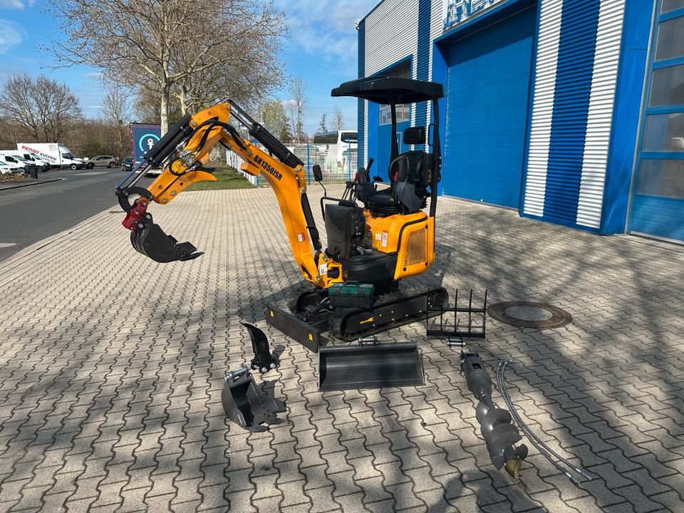 Berger Kraus BK1350JSR mini excavator, side view with accessories Berger Kraus BK1350JSR mini excavator, side view with accessories