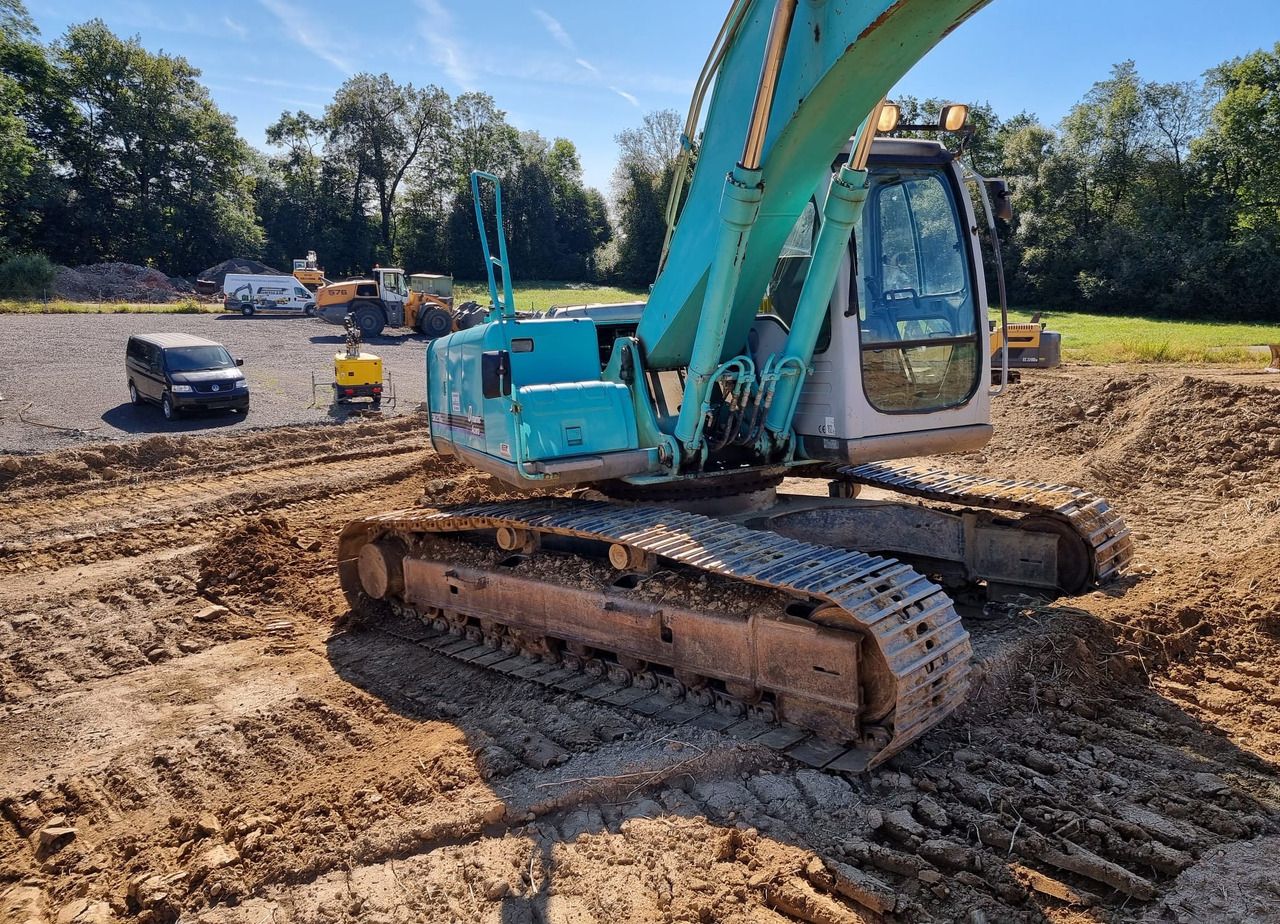 2004 Kobelco SK210NLC-6E crawler excavator, rear three-quarter view