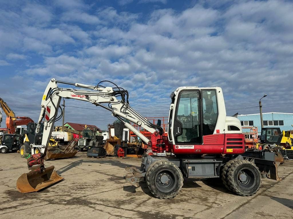 2018 Takeuchi TB295W wheel excavator side view 2018 Takeuchi TB295W wheel excavator side view