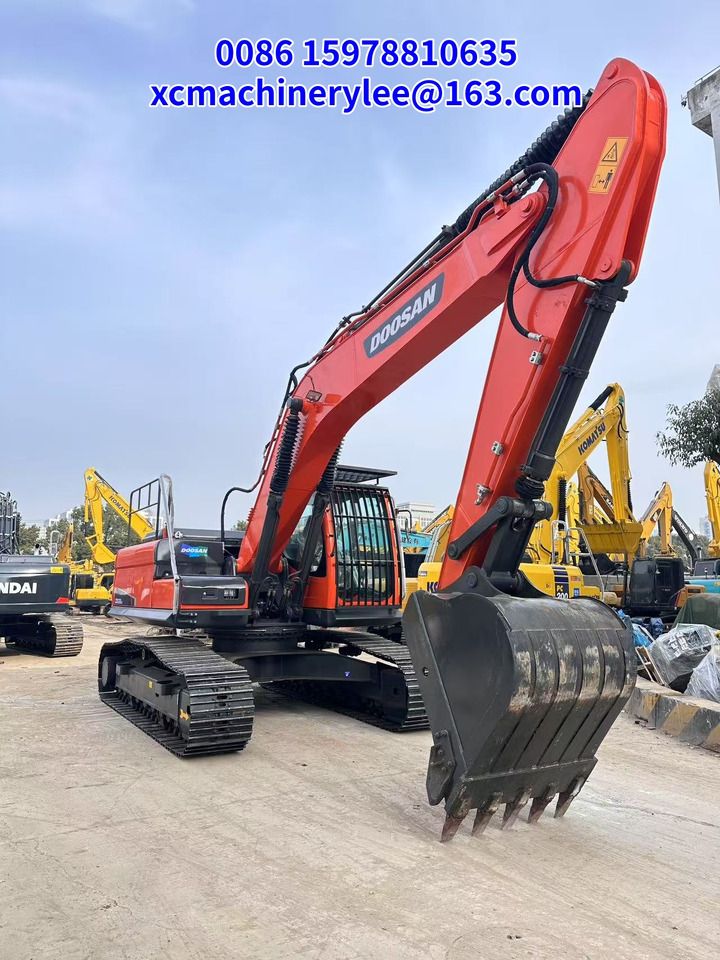 2023 Doosan DX225 crawler excavator, front three-quarter view 2023 Doosan DX225 crawler excavator, front three-quarter view