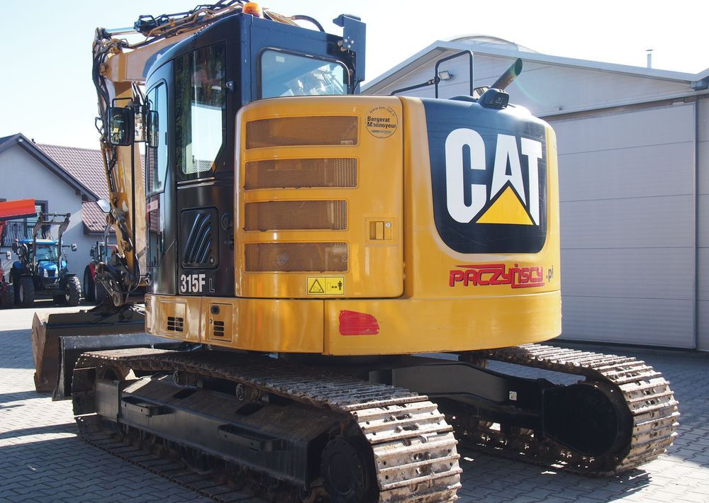 2018 Caterpillar 315FL crawler excavator, rear three-quarter view 2018 Caterpillar 315FL crawler excavator, rear three-quarter view