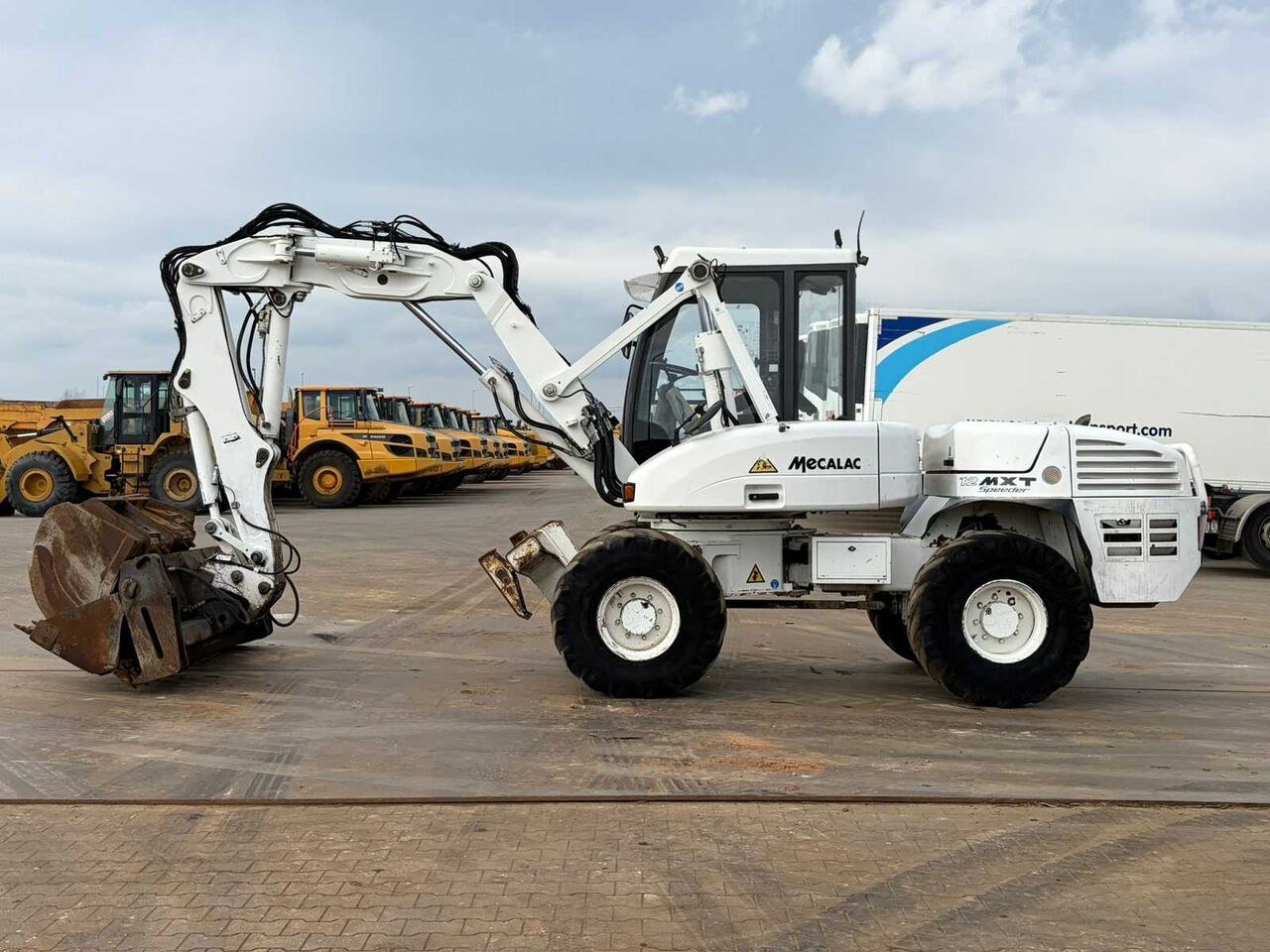 2013 Mecalac 12MXT wheel excavator side view