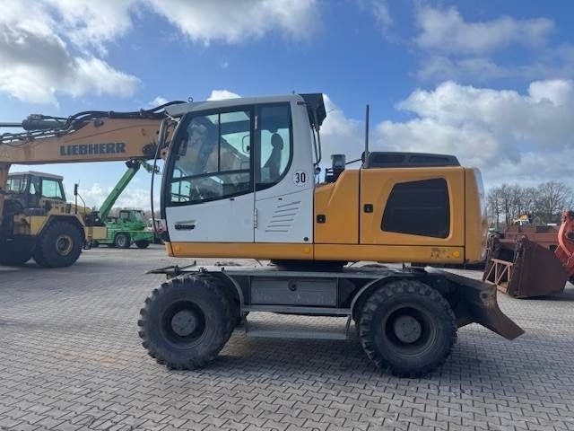 2013 Liebherr A916 wheel excavator side view 2013 Liebherr A916 wheel excavator side view